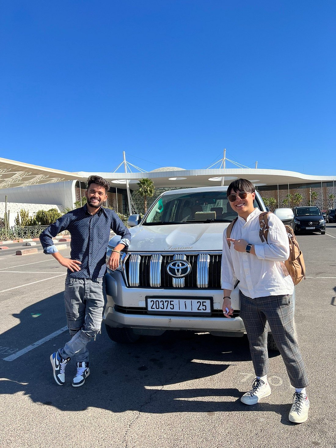 Private car and driver with clients Private car and driver with clients